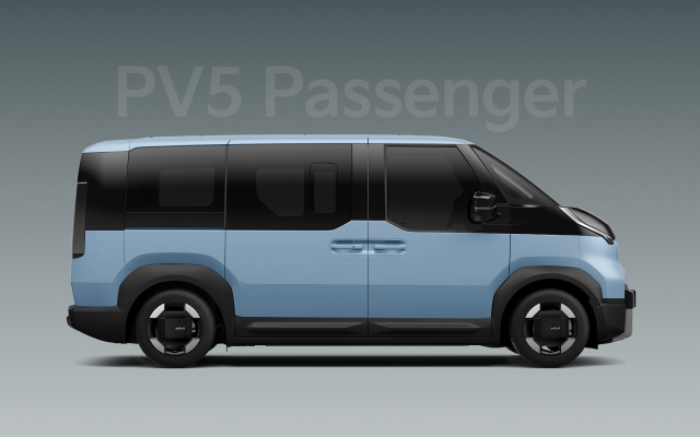 Side view of the two-tone blue Kia PV5 Passenger