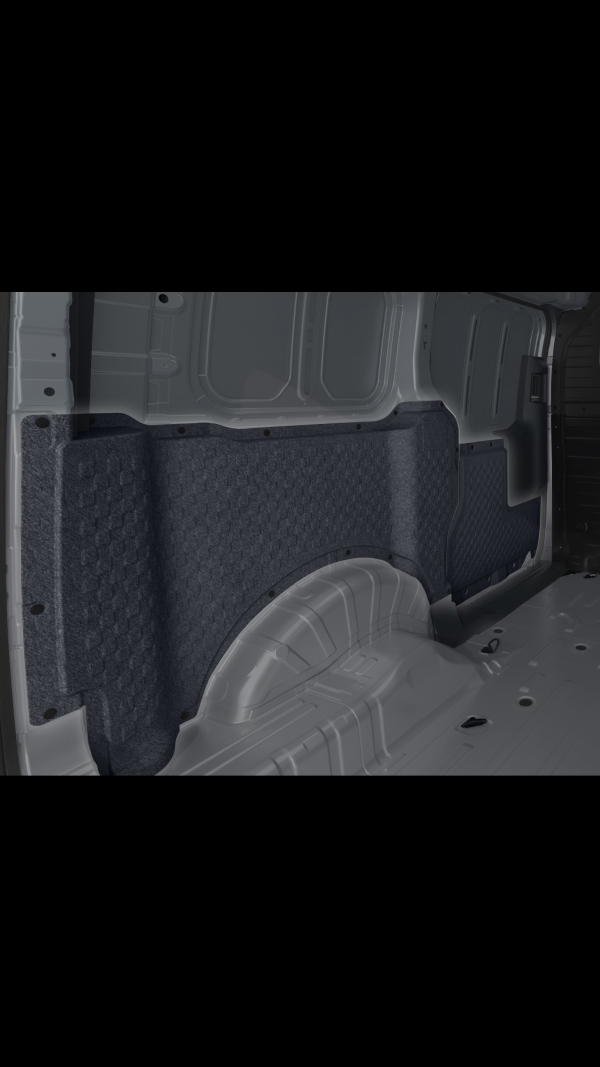 Close-up of the Kia PV5 Cargo interior side wall panel