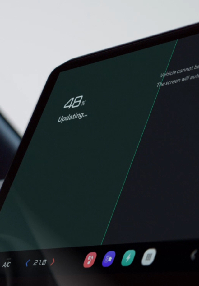 Infotainment screen showing over-the-air update in progress