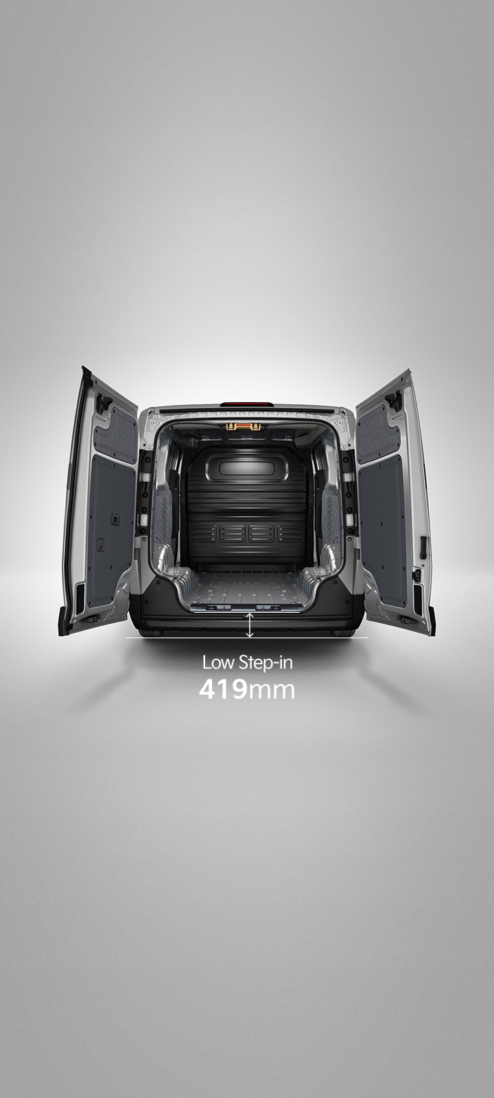 Rear view of the Kia PV5 Cargo with opened cargo doors