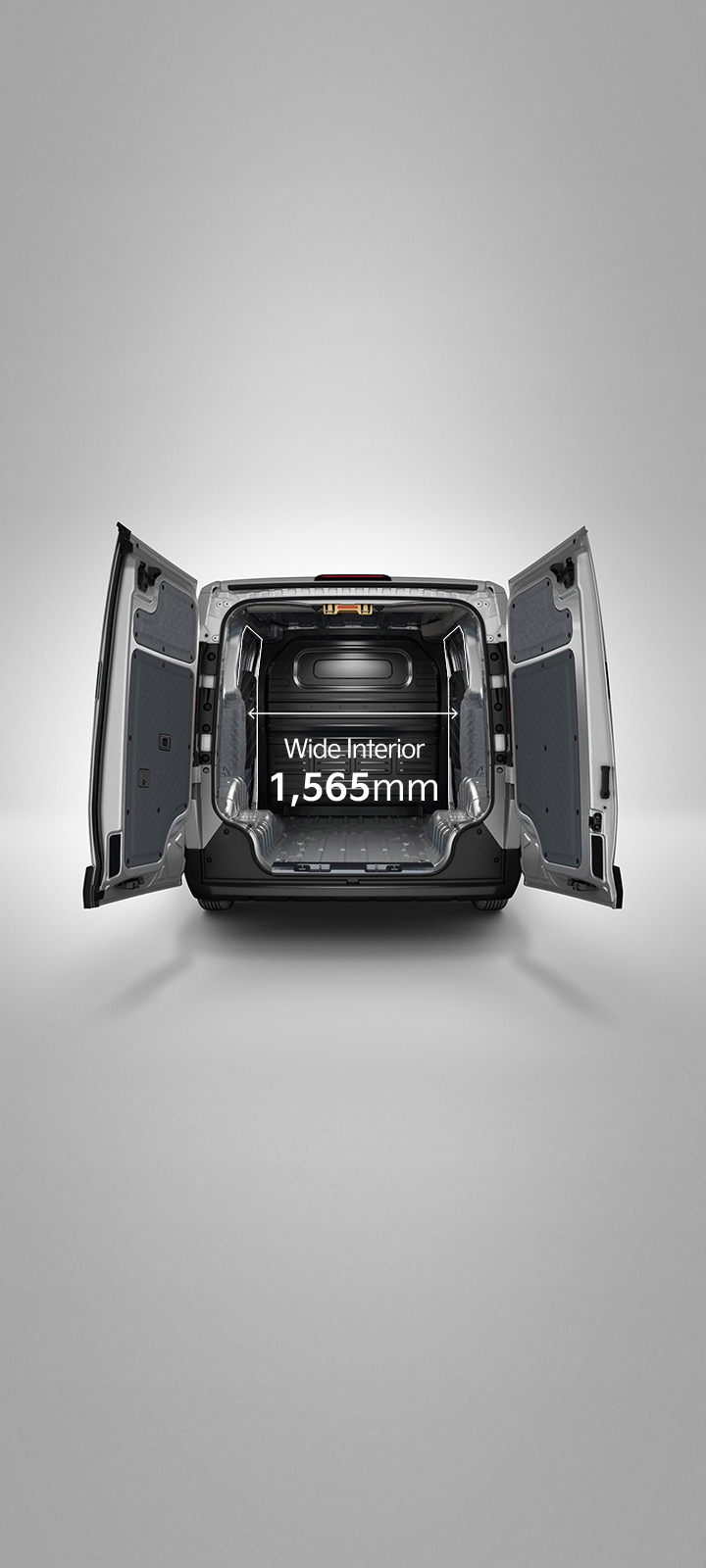 Rear view of the Kia PV5 Cargo with opened cargo doors