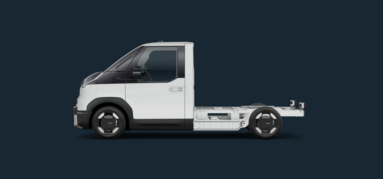 Side view of white Kia PV5 Chassis Cab