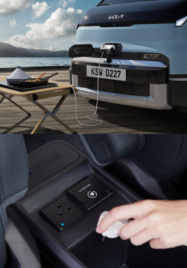 Hand plugging device into interior outlet and front view of van using V2L power