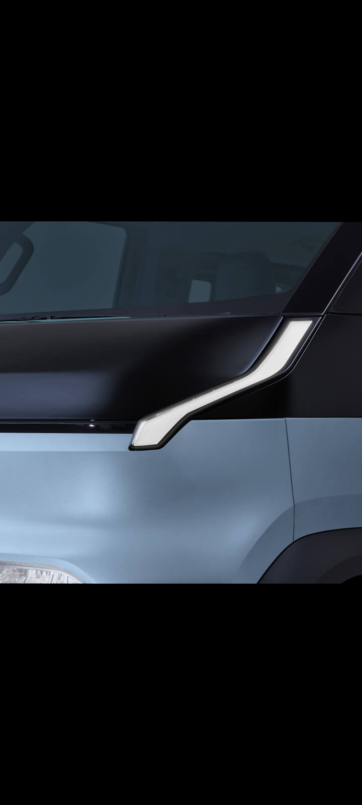 Close-up of the Kia PV5 Passenger LED daytime running lights
