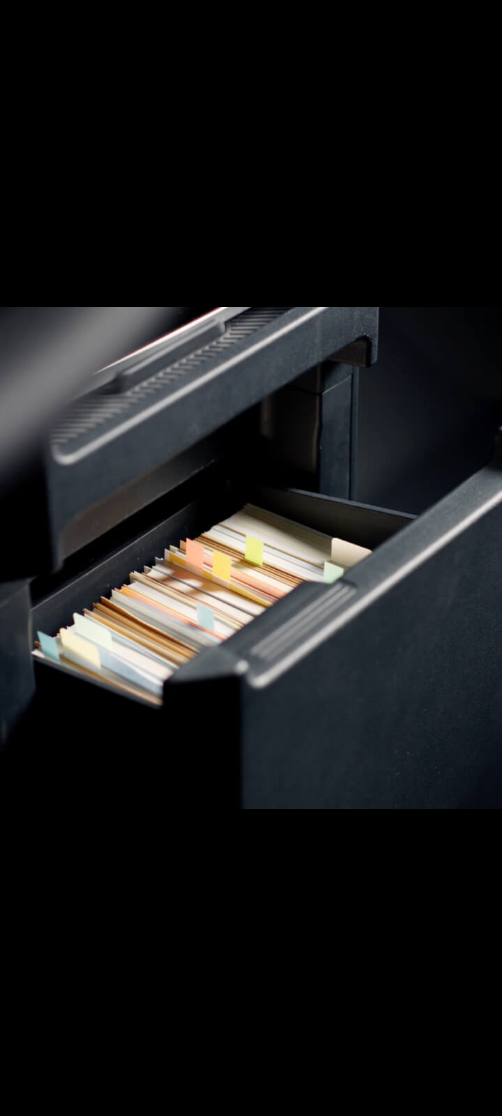Centre console drawer of the Kia PV5 Passenger with files stored inside