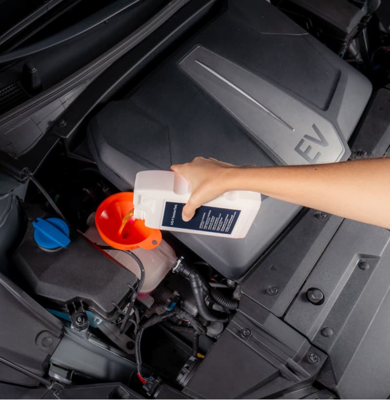 Refilling the Kia EV with Kia EV Battery Coolant.