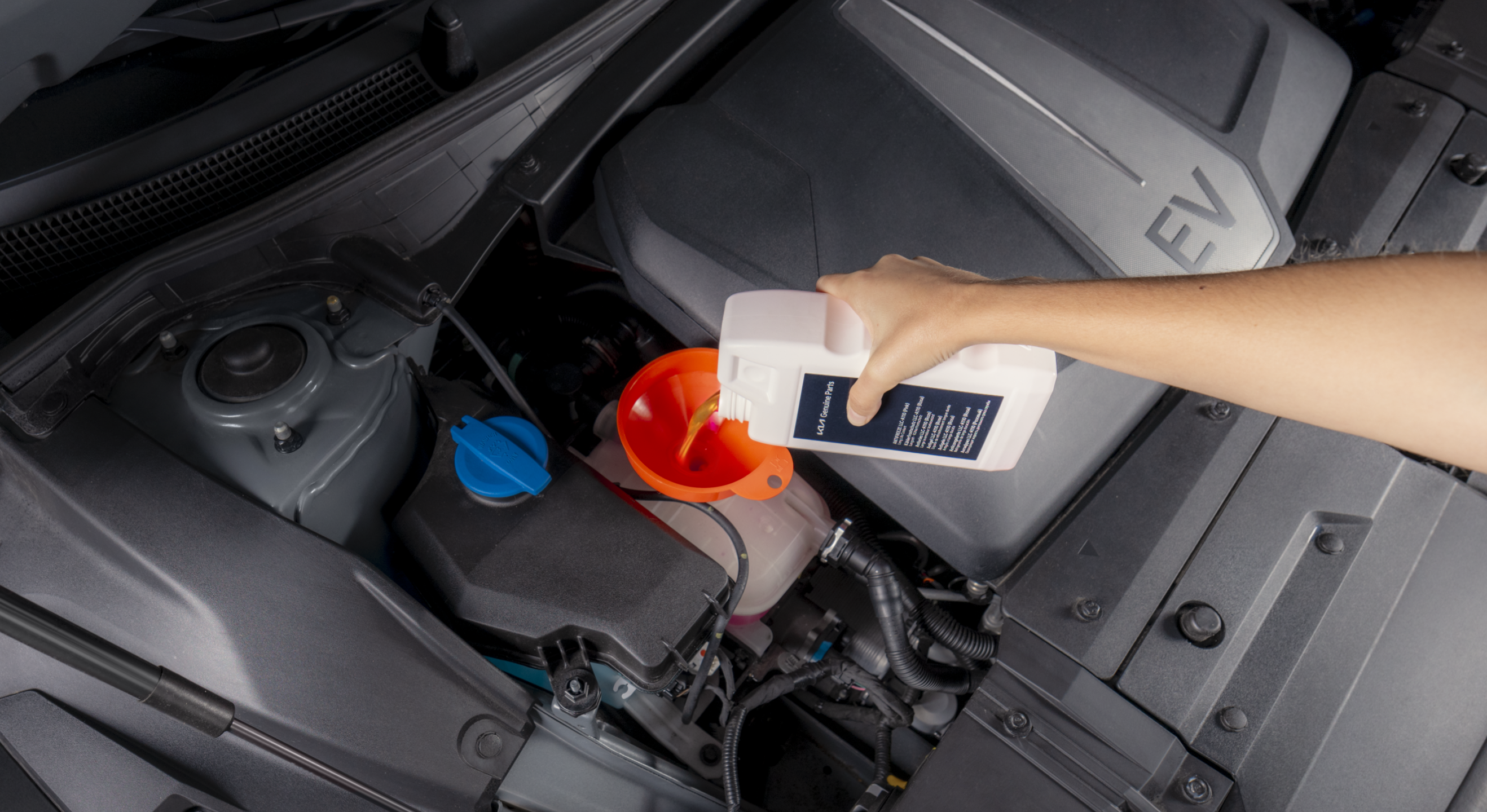 Customer refills his EV with Antifreeze from Kia Genuine Parts.