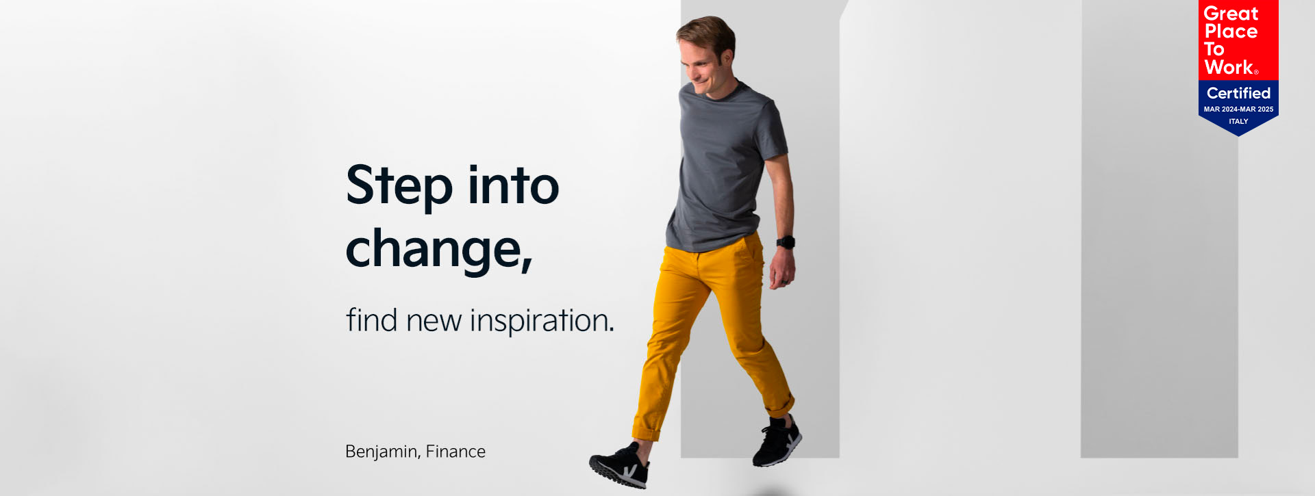 Benjamin from our Finance department makes a step forward. Behind him is the letter "M". Next to him we find the statement "Step into change - find new inspiration".
