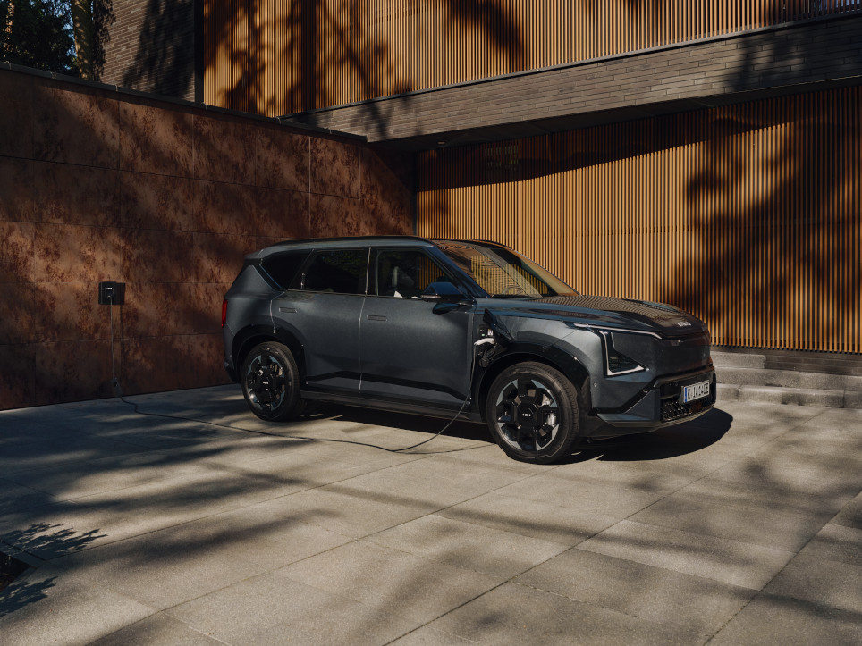 A Kia Electric car charging at home via an Electric car charger installed at home